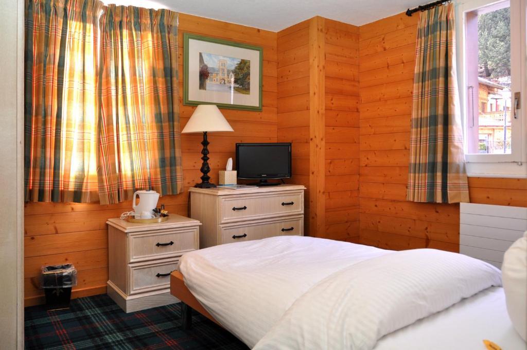 Hotel De La Paix Champéry Rum bild