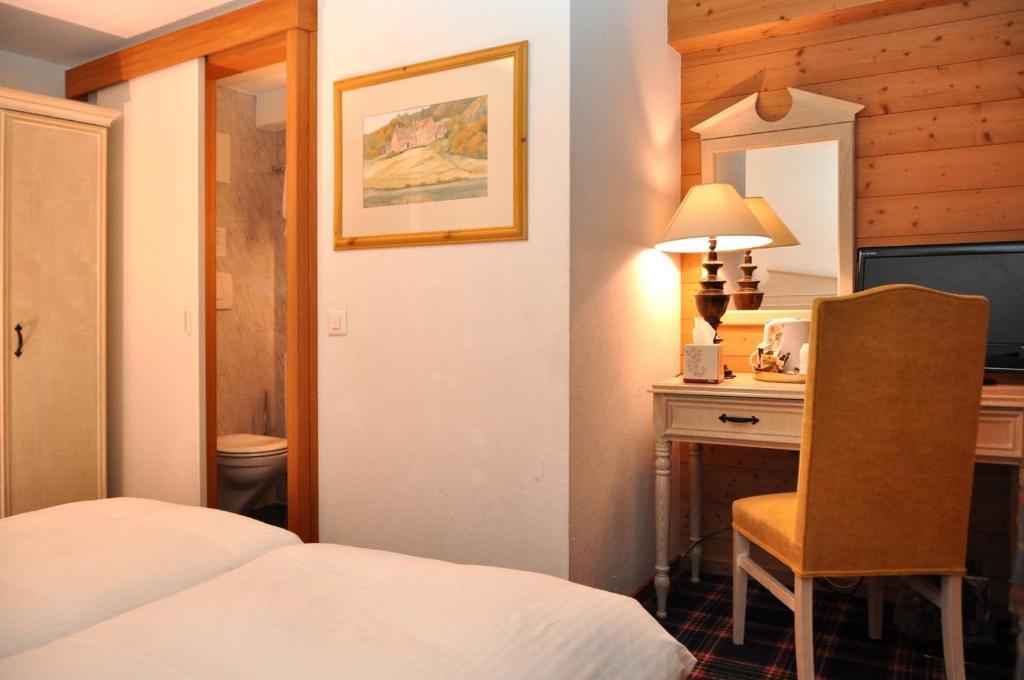Hotel De La Paix Champéry Rum bild