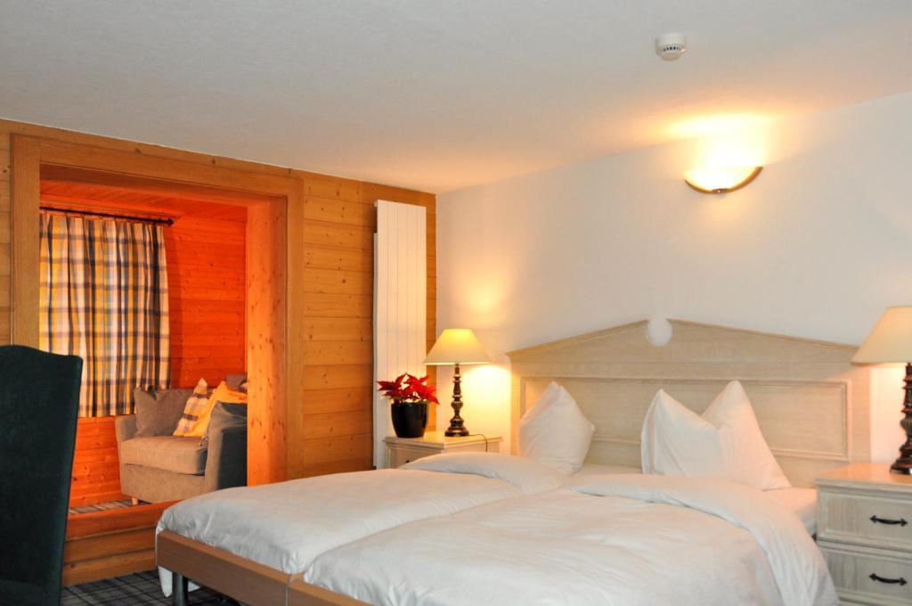 Hotel De La Paix Champéry Rum bild