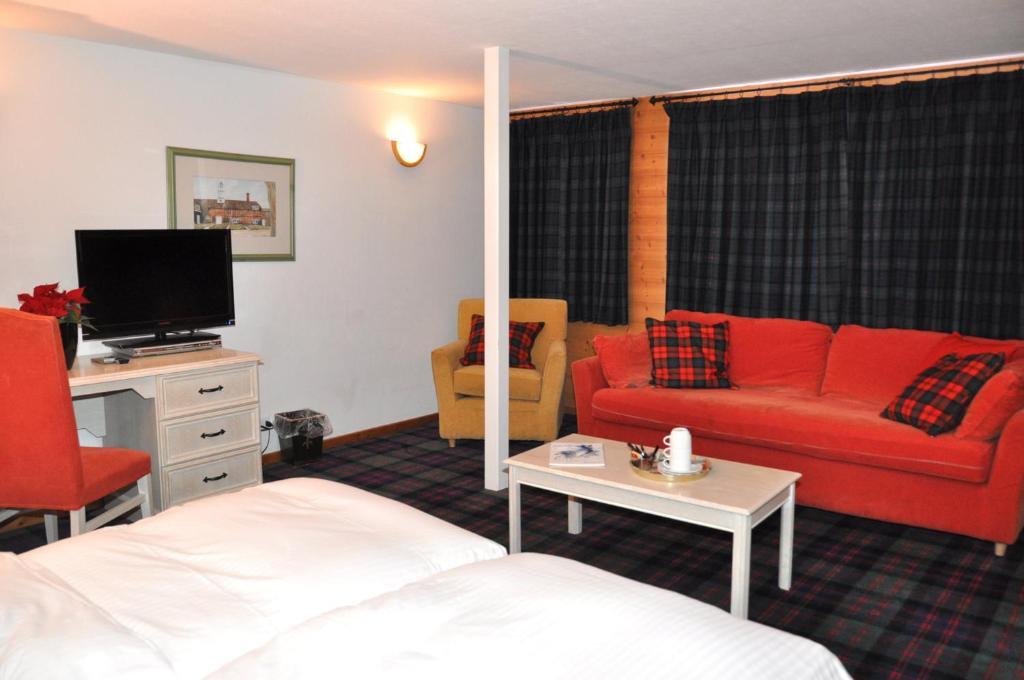 Hotel De La Paix Champéry Rum bild