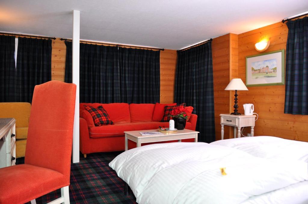 Hotel De La Paix Champéry Rum bild