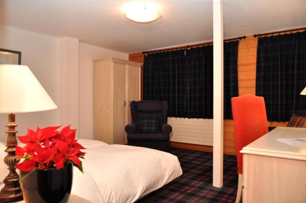 Hotel De La Paix Champéry Rum bild