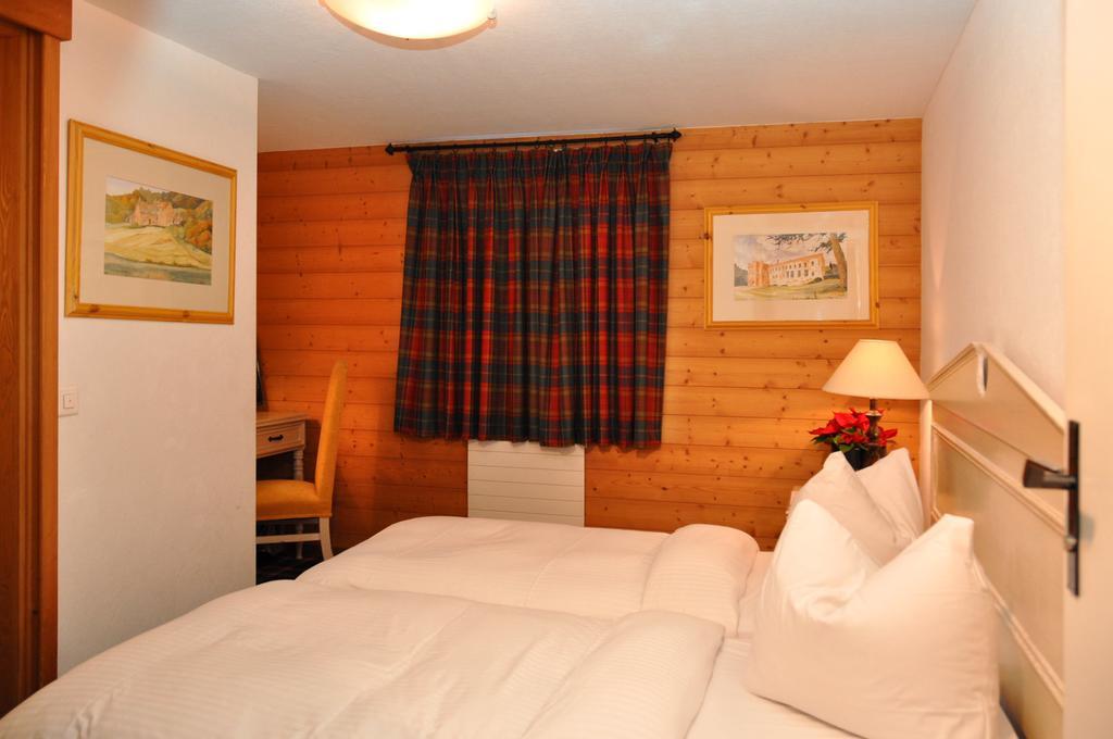 Hotel De La Paix Champéry Rum bild